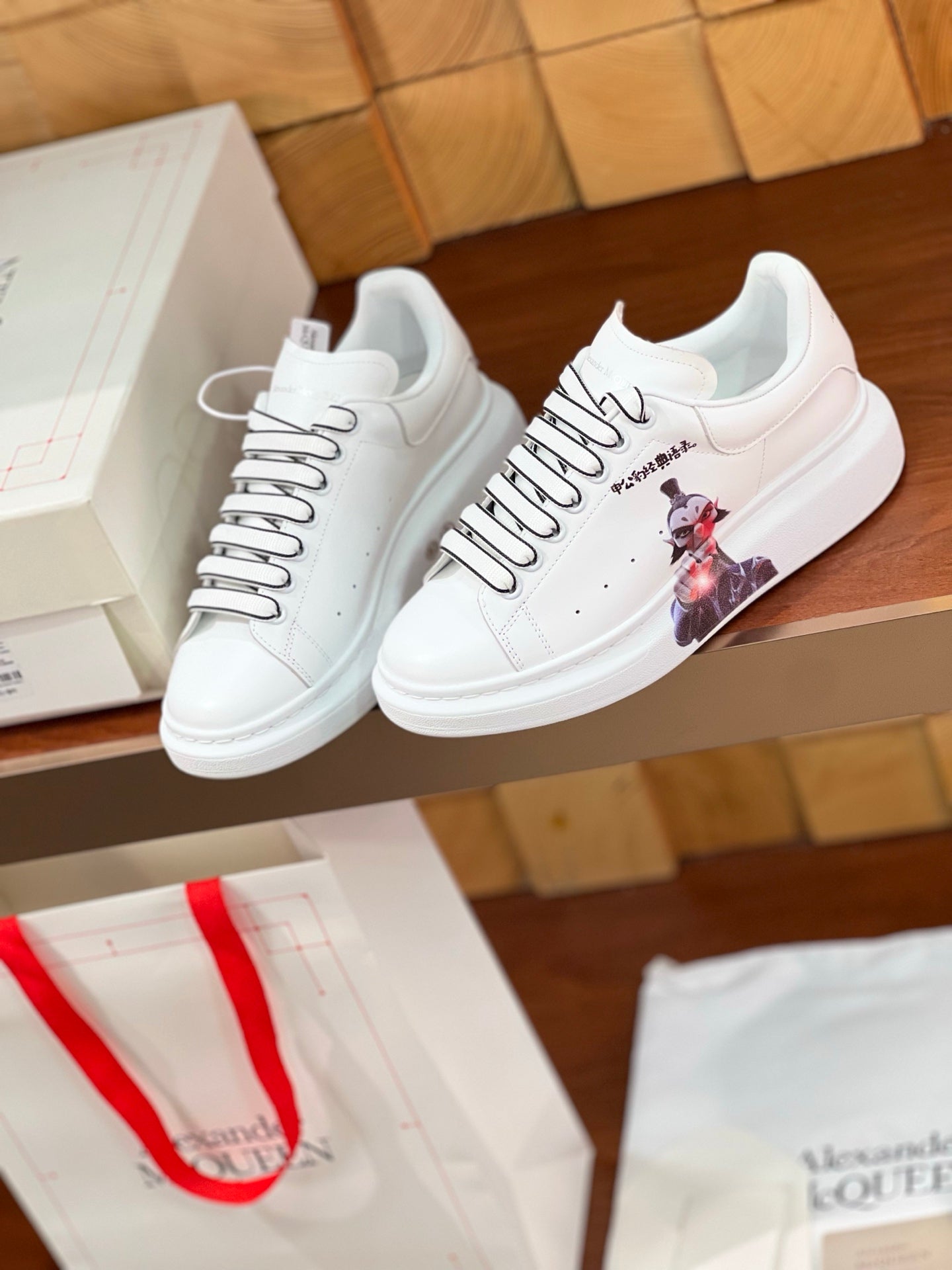 OVERSIZED SNEAKERS IN WHITE CALFSKIN CARTOON FIGURE BLACK TRIM LACES