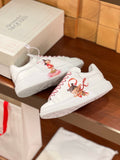 OVERSIZED SNEAKERS IN WHITE CALFSKIN WITH CARTOON FIGURE