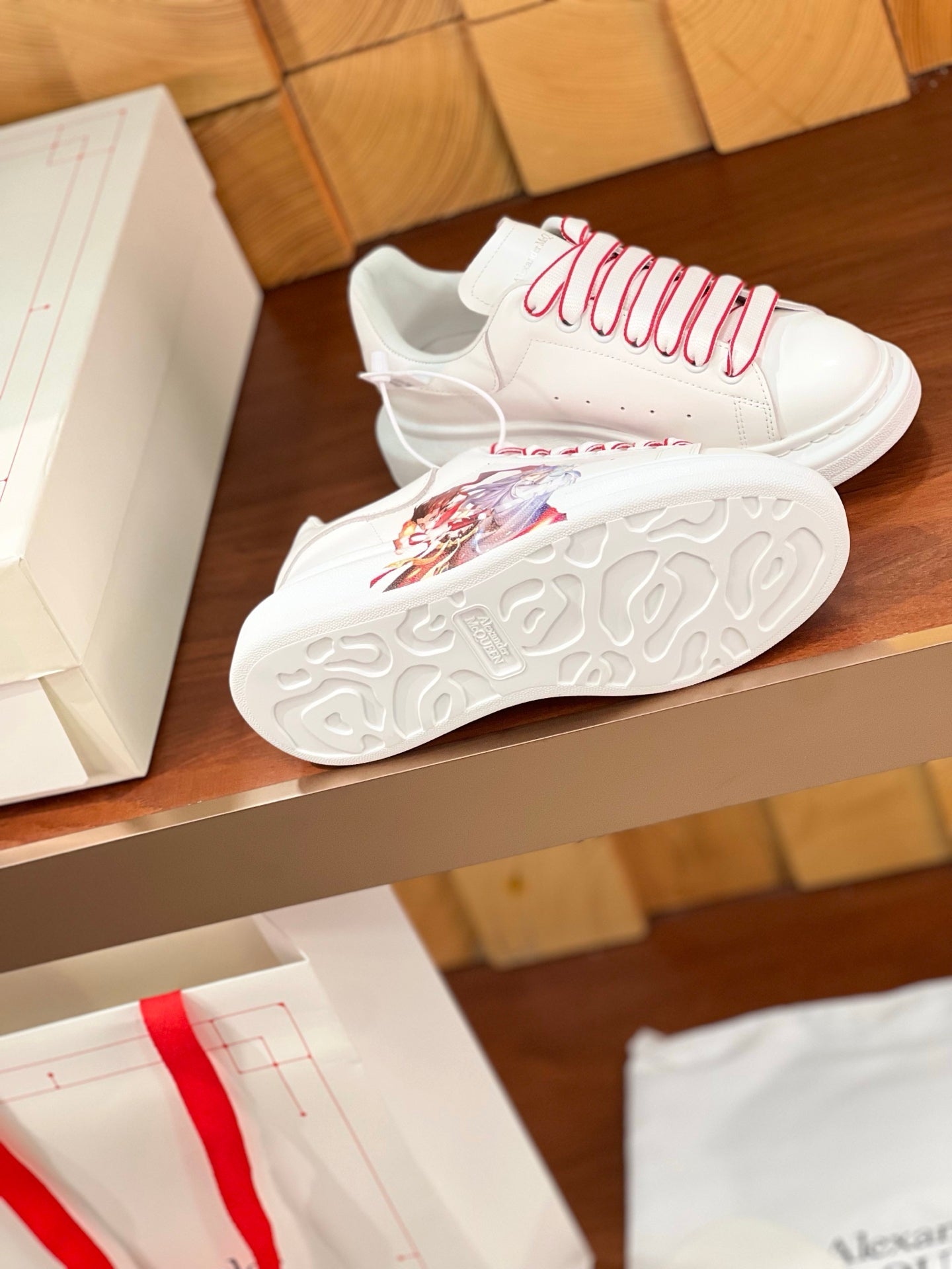 OVERSIZED SNEAKERS IN WHITE CALFSKIN NATRA GRAPHIC RED TRIM LACES