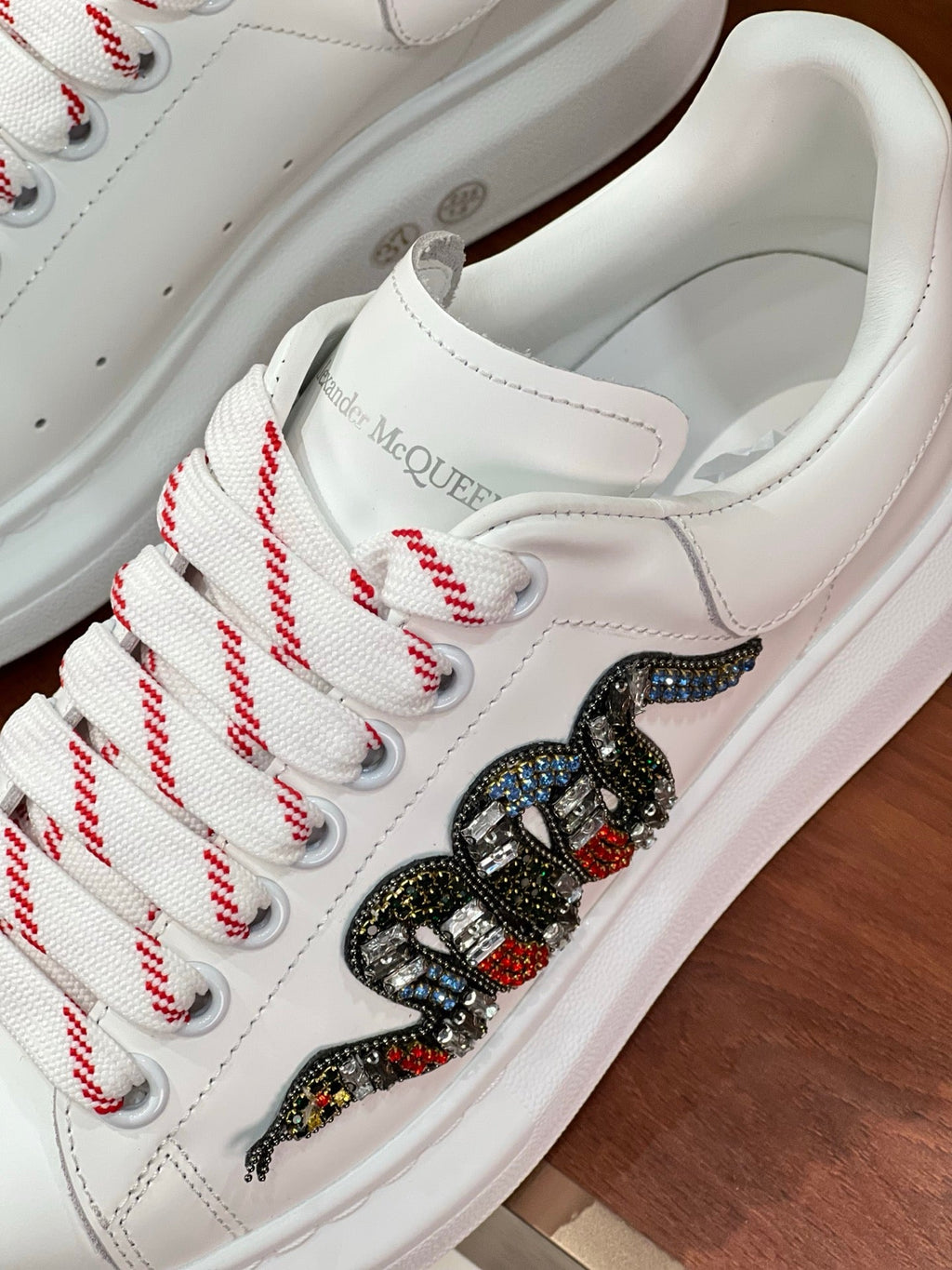 OVERSIZED SNEAKERS IN WHITE CALFSKIN EMBROIDERED CRYSTAL SNAKE