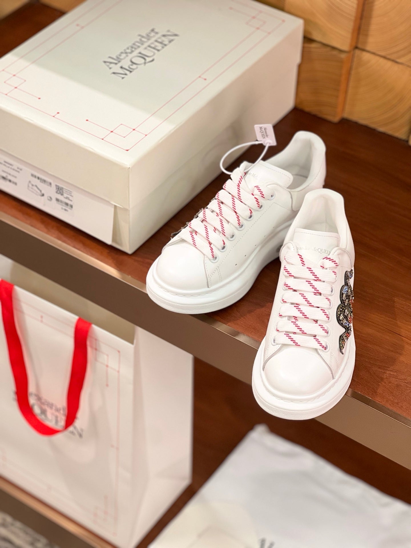 OVERSIZED SNEAKERS IN WHITE CALFSKIN EMBROIDERED CRYSTAL SNAKE