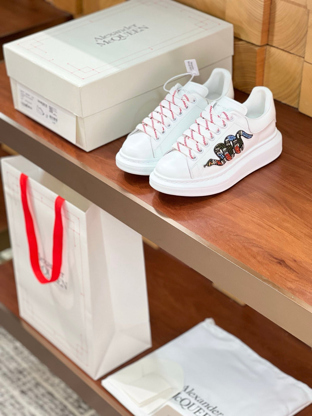 OVERSIZED SNEAKERS IN WHITE CALFSKIN EMBROIDERED CRYSTAL SNAKE
