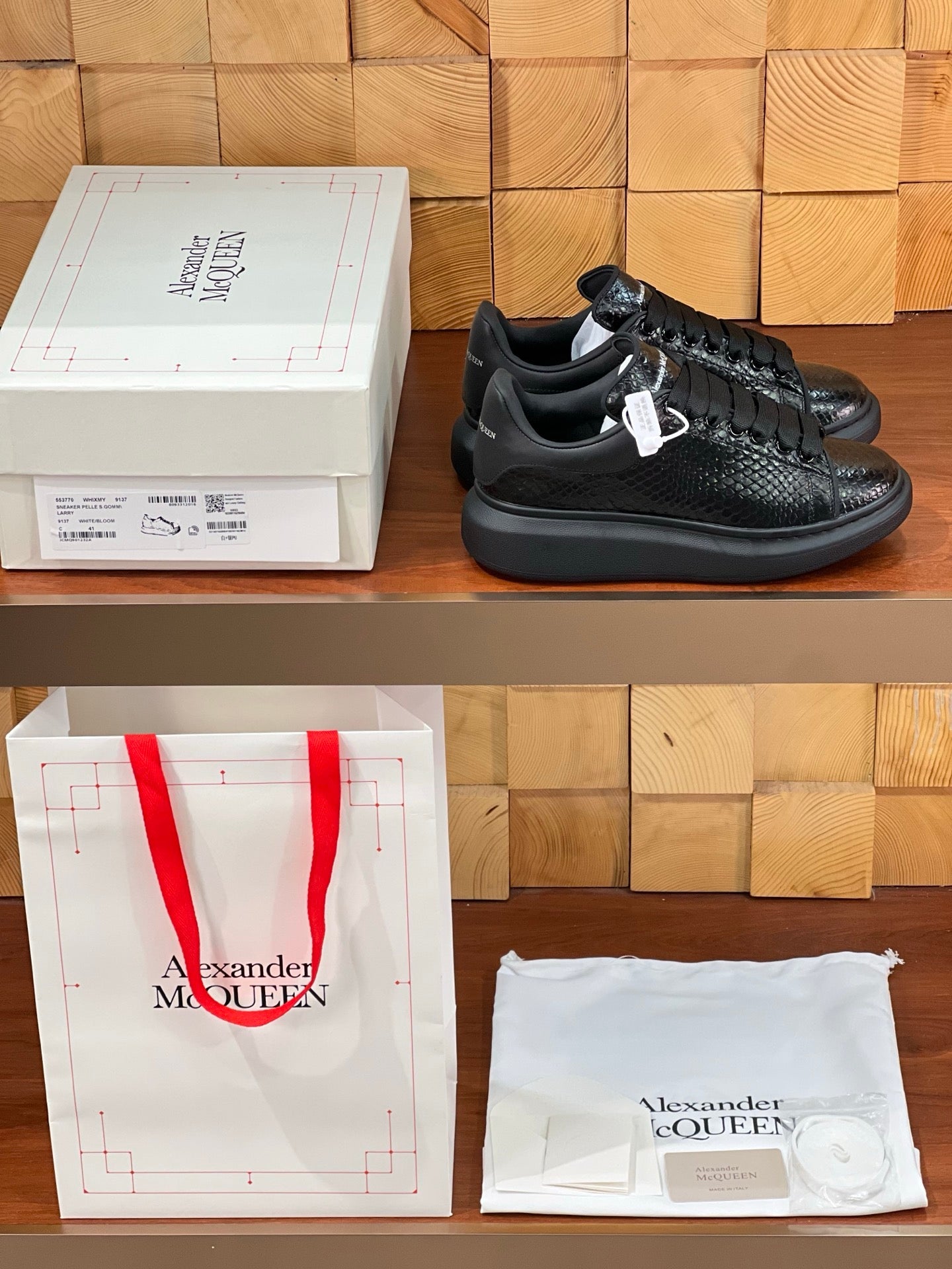 OVERSIZED SNEAKERS IN BLACK GLOSSY CALFSKIN SNAKE-EFFECT