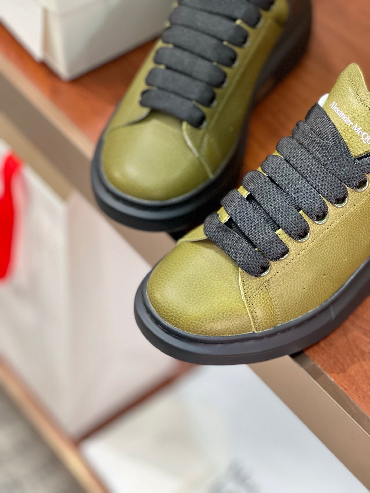 OVERSIZED SNEAKERS IN ARMY GREEN CALFSKIN