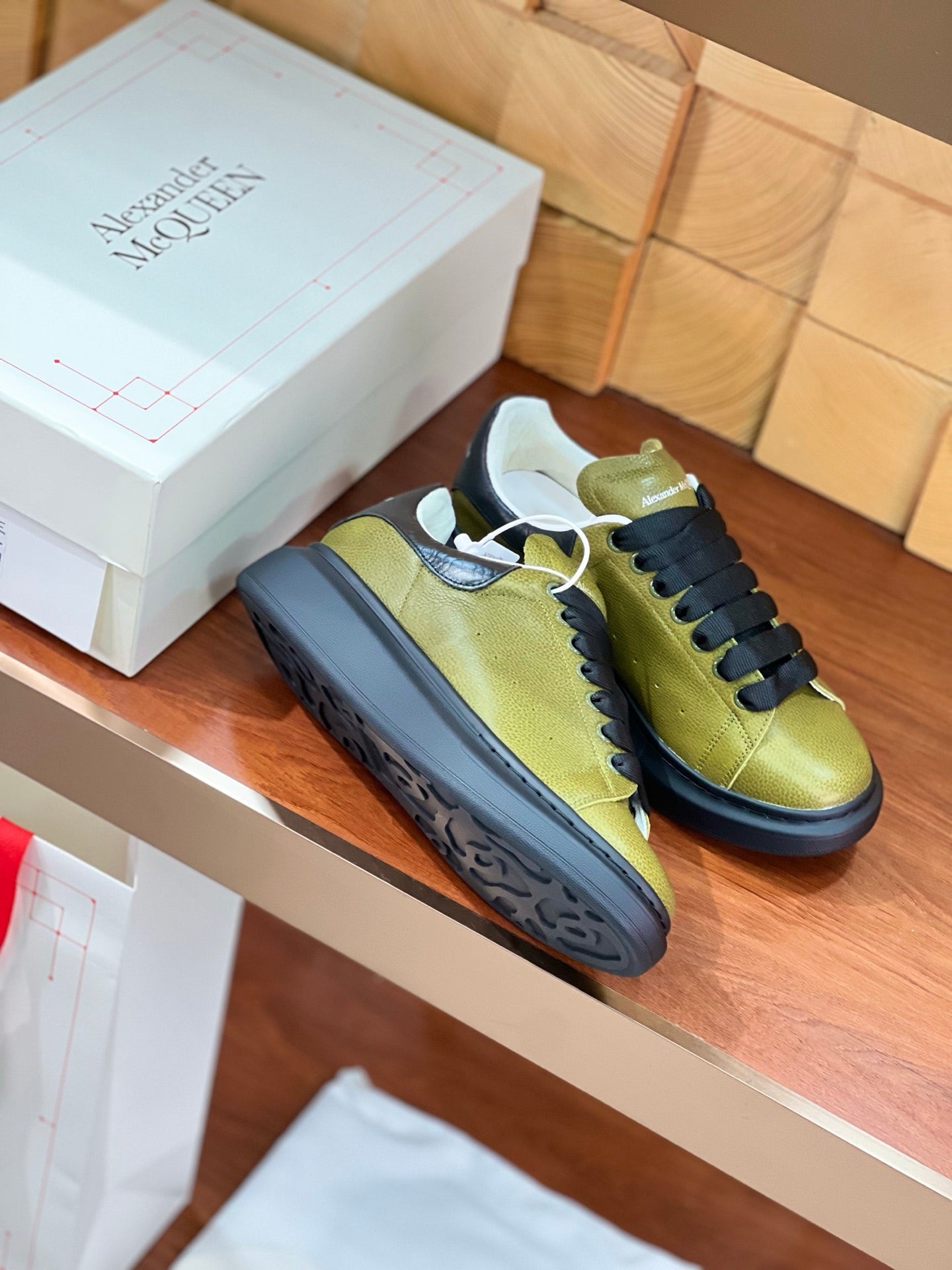 OVERSIZED SNEAKERS IN ARMY GREEN CALFSKIN