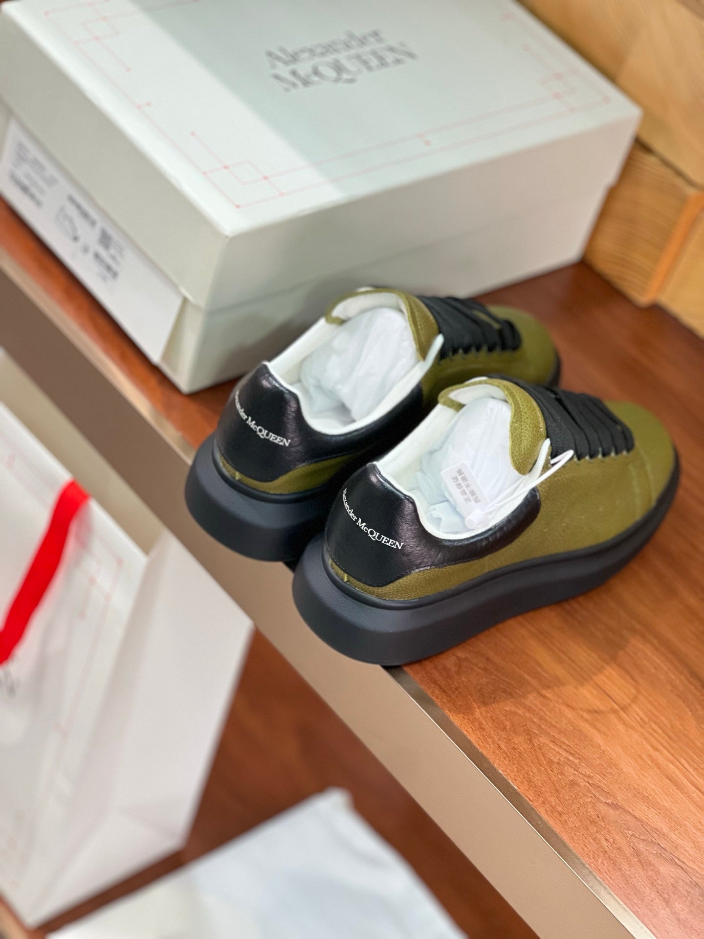 OVERSIZED SNEAKERS IN ARMY GREEN CALFSKIN