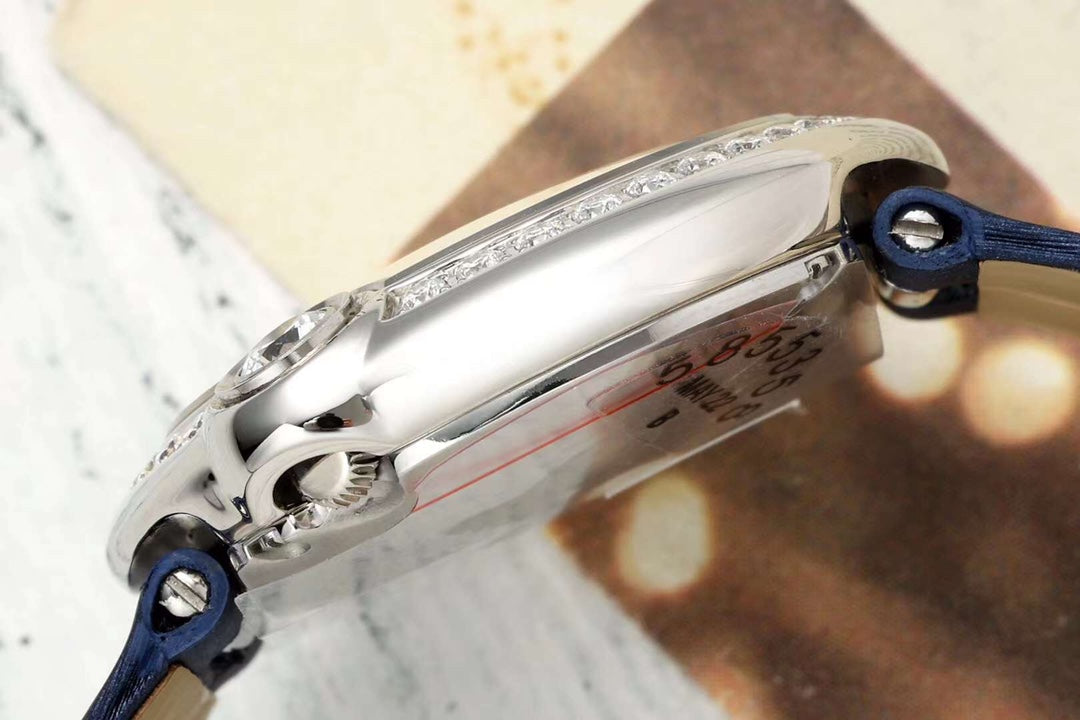 BALLON BLANC DE CARTIER WATCH GOLD CASE AND NAVY BLUE CALFSKIN WITH CRYSTALS
