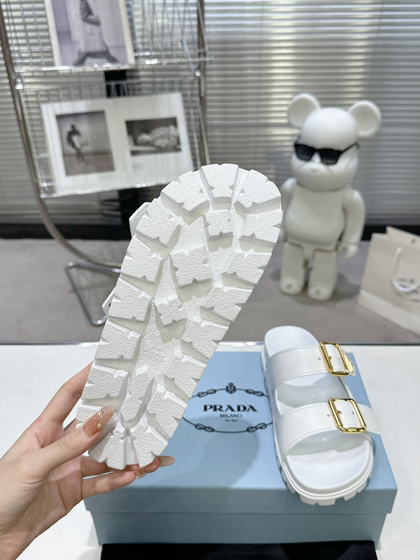 PRADA 25S STRAP SLIDES 30MM IN WHITE CALFSKIN GOLD HARDWARE