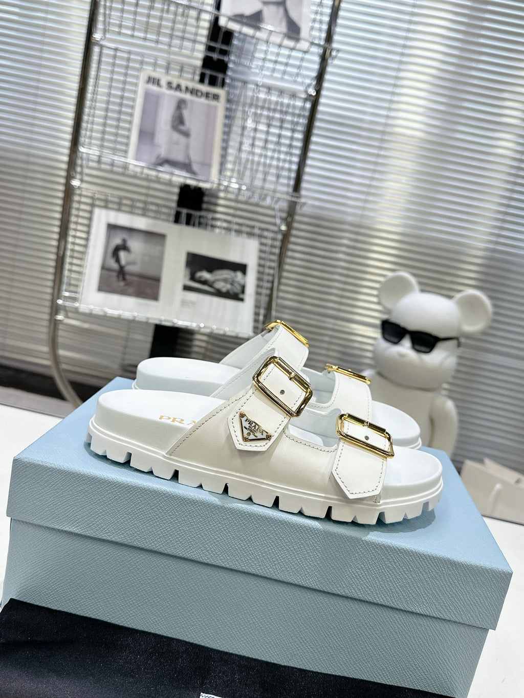 PRADA 25S STRAP SLIDES 30MM IN WHITE CALFSKIN GOLD HARDWARE