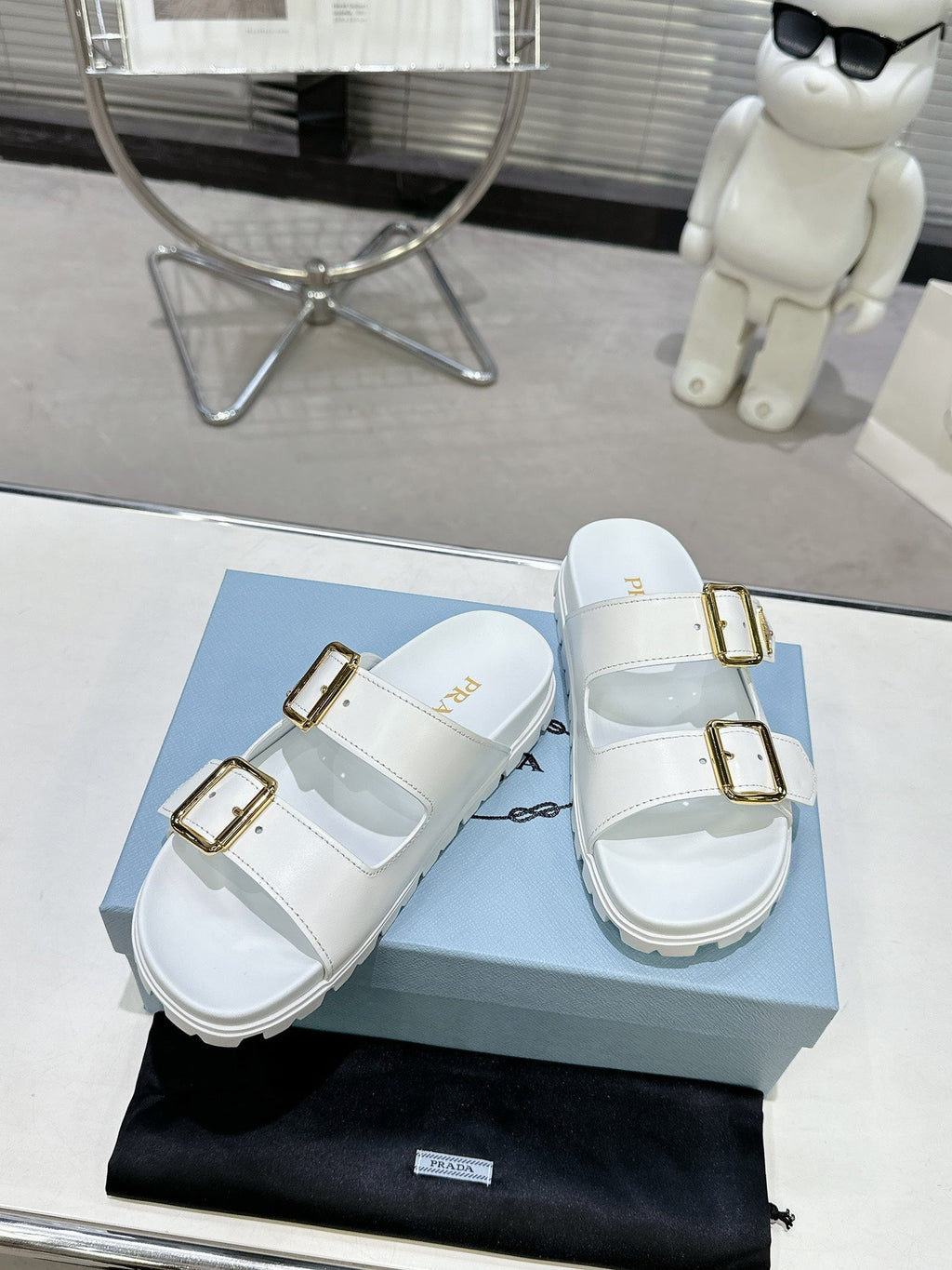 PRADA 25S STRAP SLIDES 30MM IN WHITE CALFSKIN GOLD HARDWARE