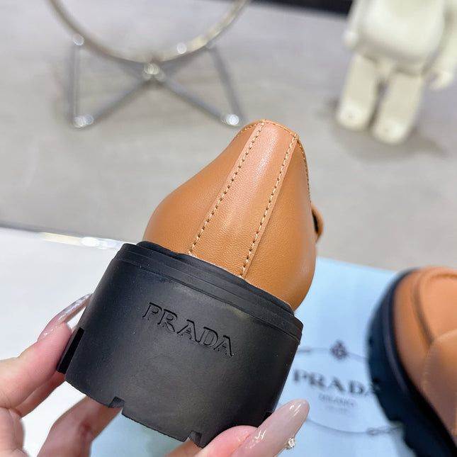 PRADA 25S THICK-SOLE LOAFERS 60 MM IN COGNAC BROWN CALFSKIN