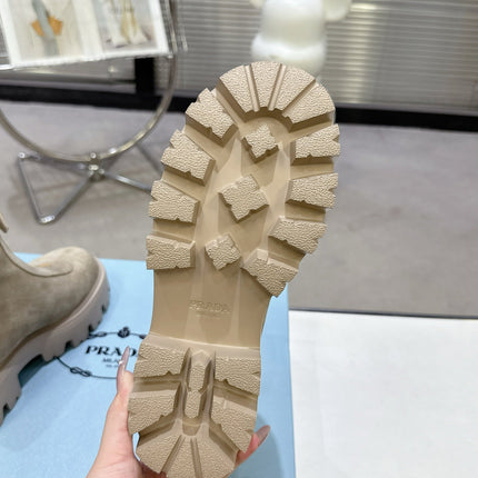 PRADA 25S ZIP-UP ANKLE BOOTS IN BEIGE SUEDE