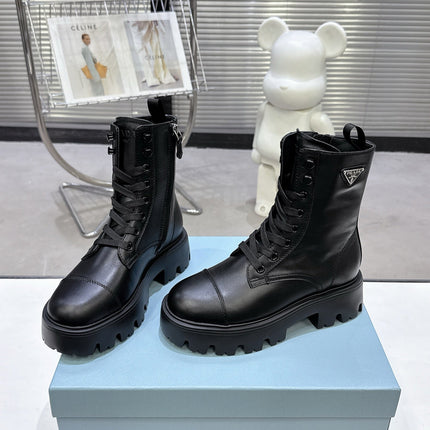 PRADA 25S WARRIOR BOOTS IN BLACK CALFSKIN