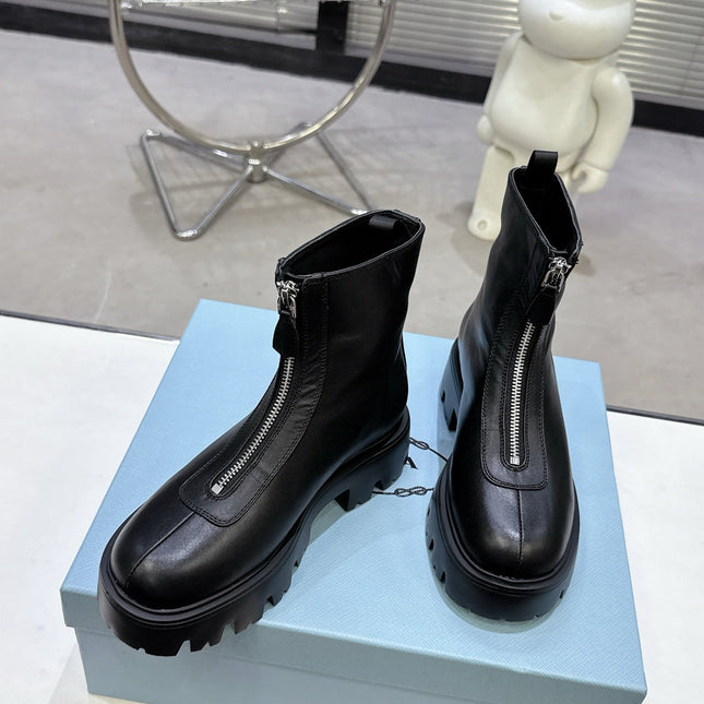 PRADA 25S ZIP-UP ANKLE BOOTS IN BLACK CALFSKIN