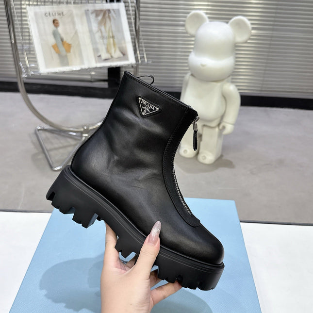 PRADA 25S ZIP-UP ANKLE BOOTS IN BLACK CALFSKIN