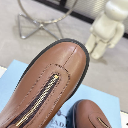 PRADA 25S ZIP-UP ANKLE BOOTS IN BROWN CALFSKIN