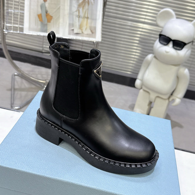 PRADA 25S RETRO PLATFORM MARTIN BOOTS IN BLACK CALFSKIN