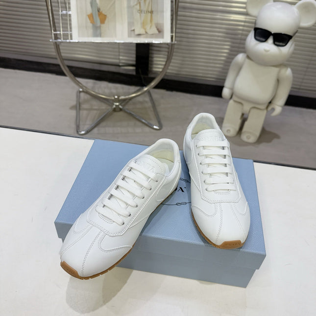 PRADA 26S LACE UP SNEAKERS IN WHITE CALFSKIN