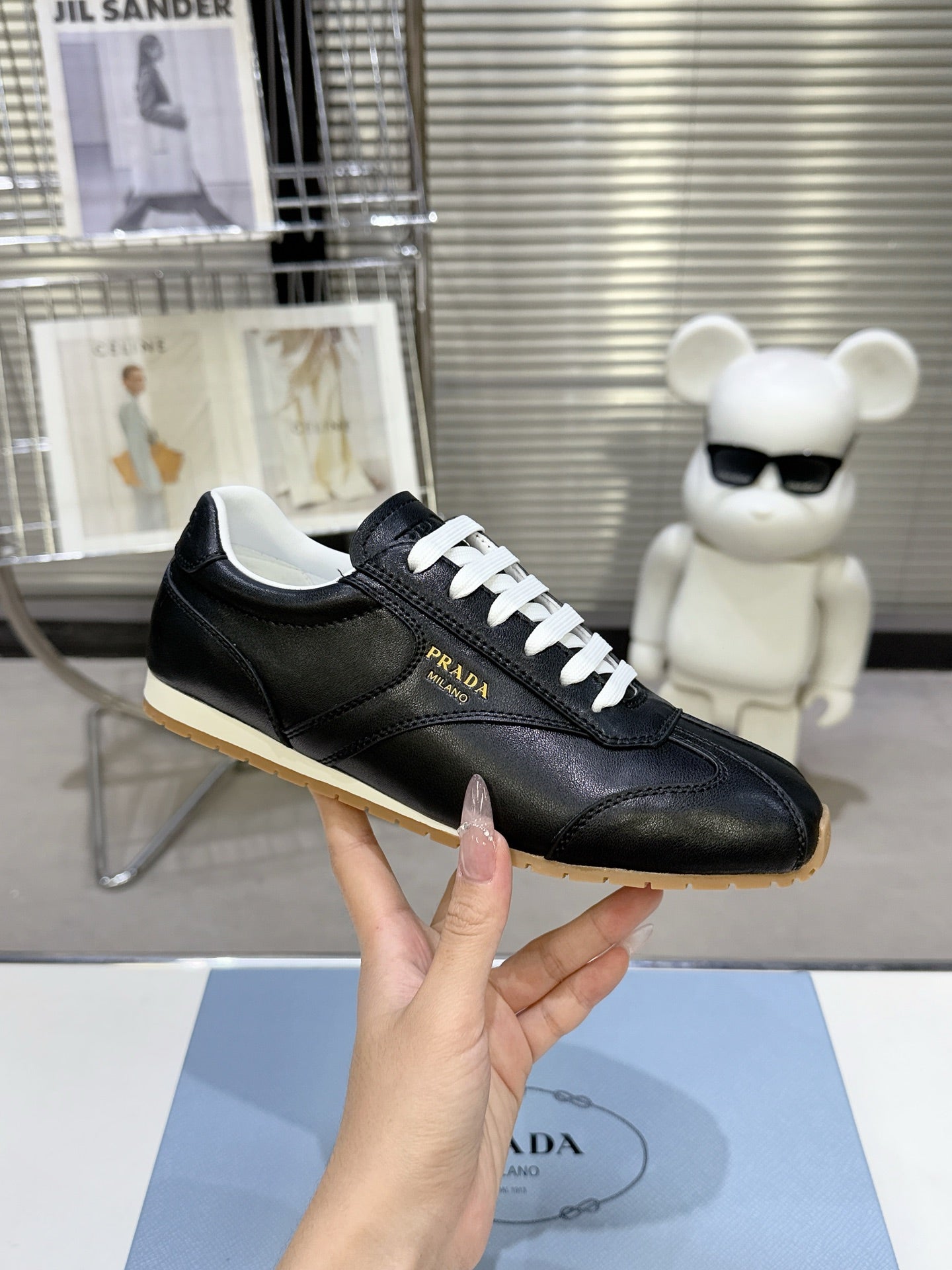 PRADA 26S LACE UP SNEAKERS IN BLACK CALFSKIN