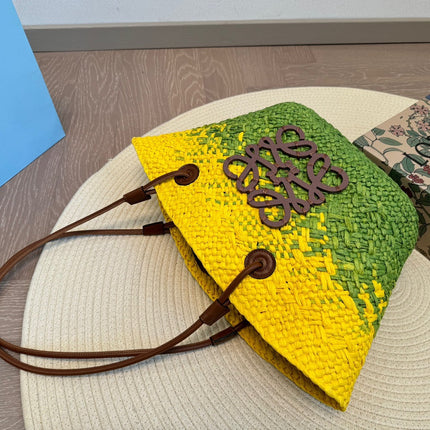 LOE SMALL ANAGRAM BASKET 28 BAG IN YELLOW MIX GREEN IRACA PALM AND CALFSKIN