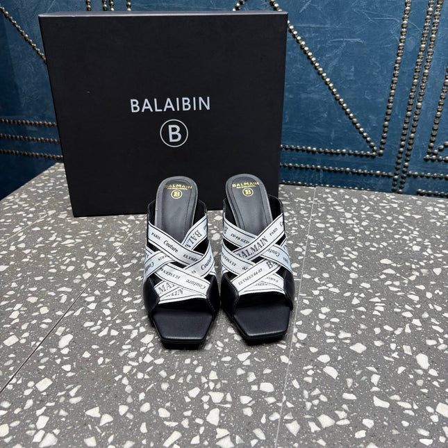 BALMAIN 26S HIGH-HEEL SANDALS 95 MM IN BLACK CALFSKIN AND WHITE FABRIC