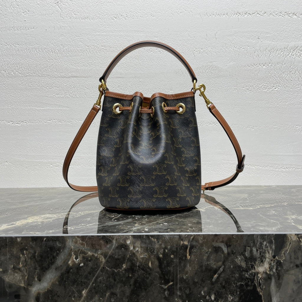 CLARA BAG 19 IN BLACK TRIOMPHE CANVAS AND BROWN CALFSKIN TRIM