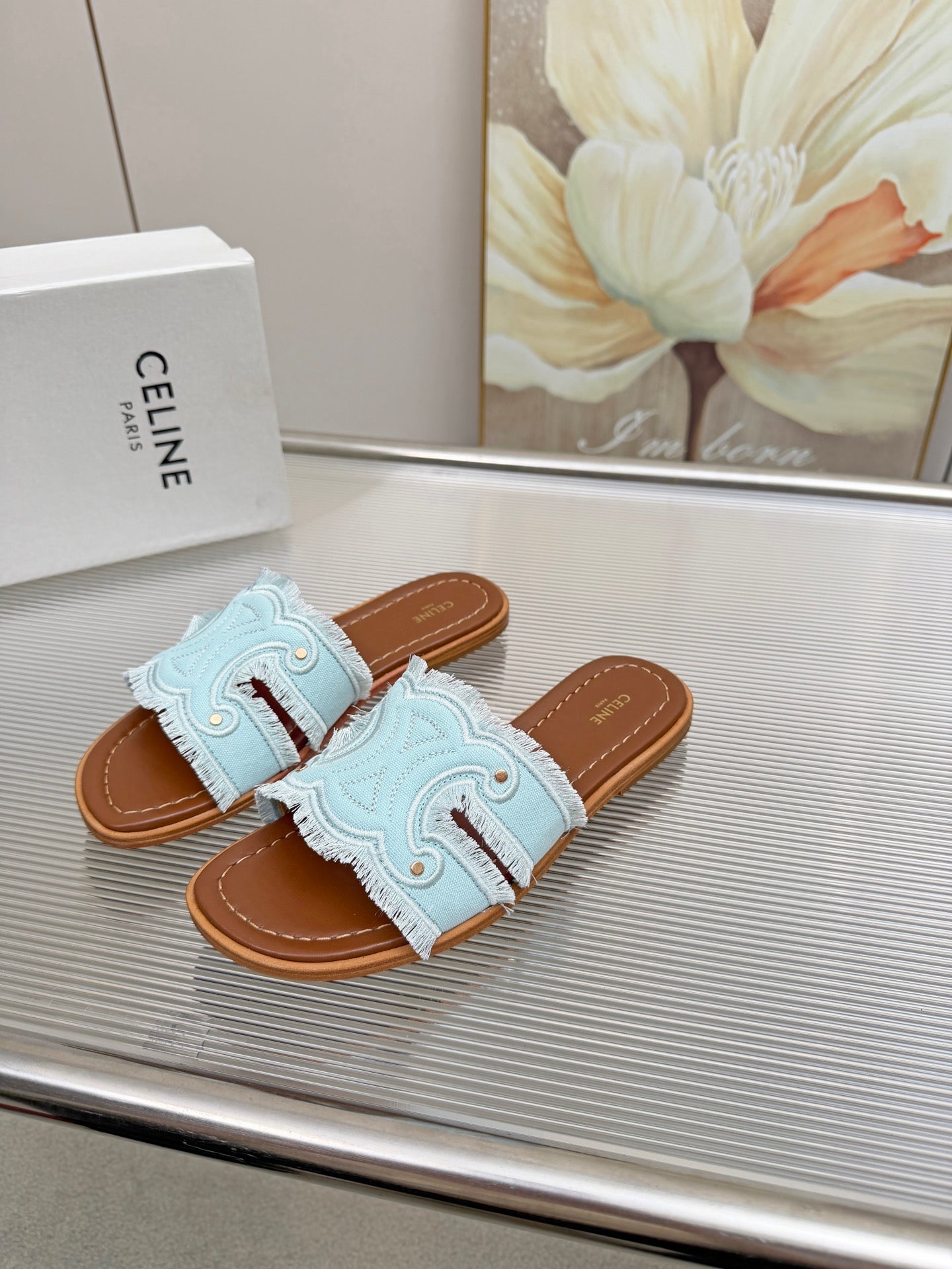 CELINE 26S TRIOMPHE SLIDE SANDALS IN SKY BLUE CANVAS