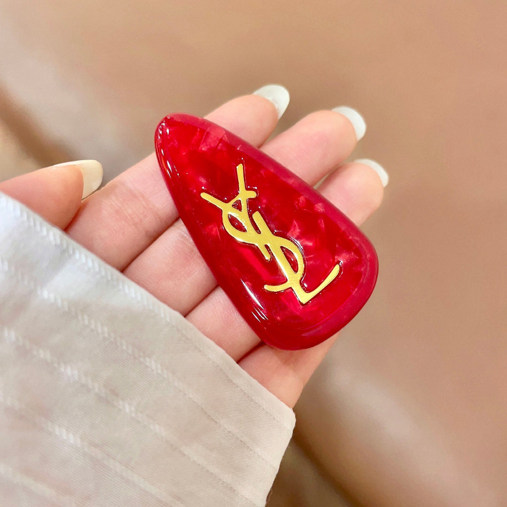 YSL 26S LOGO MARBLE EFFECT HAIR CLIP IN RED RESIN 621488