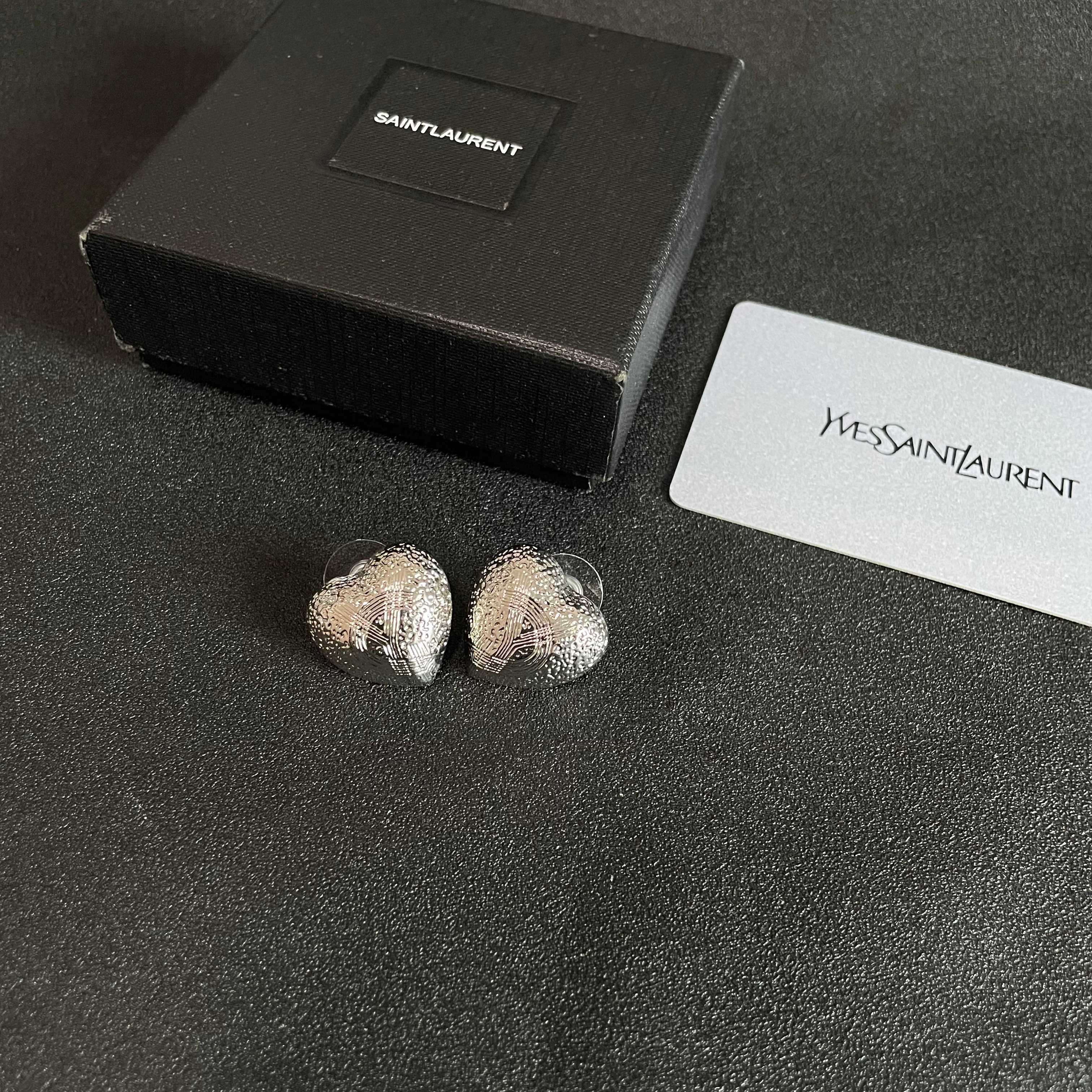 YSL 26S TEXTURED HEART STUD EARRINGS IN SILVER TONE METAL 622901