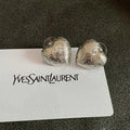 YSL 26S TEXTURED HEART STUD EARRINGS IN SILVER TONE METAL 622901