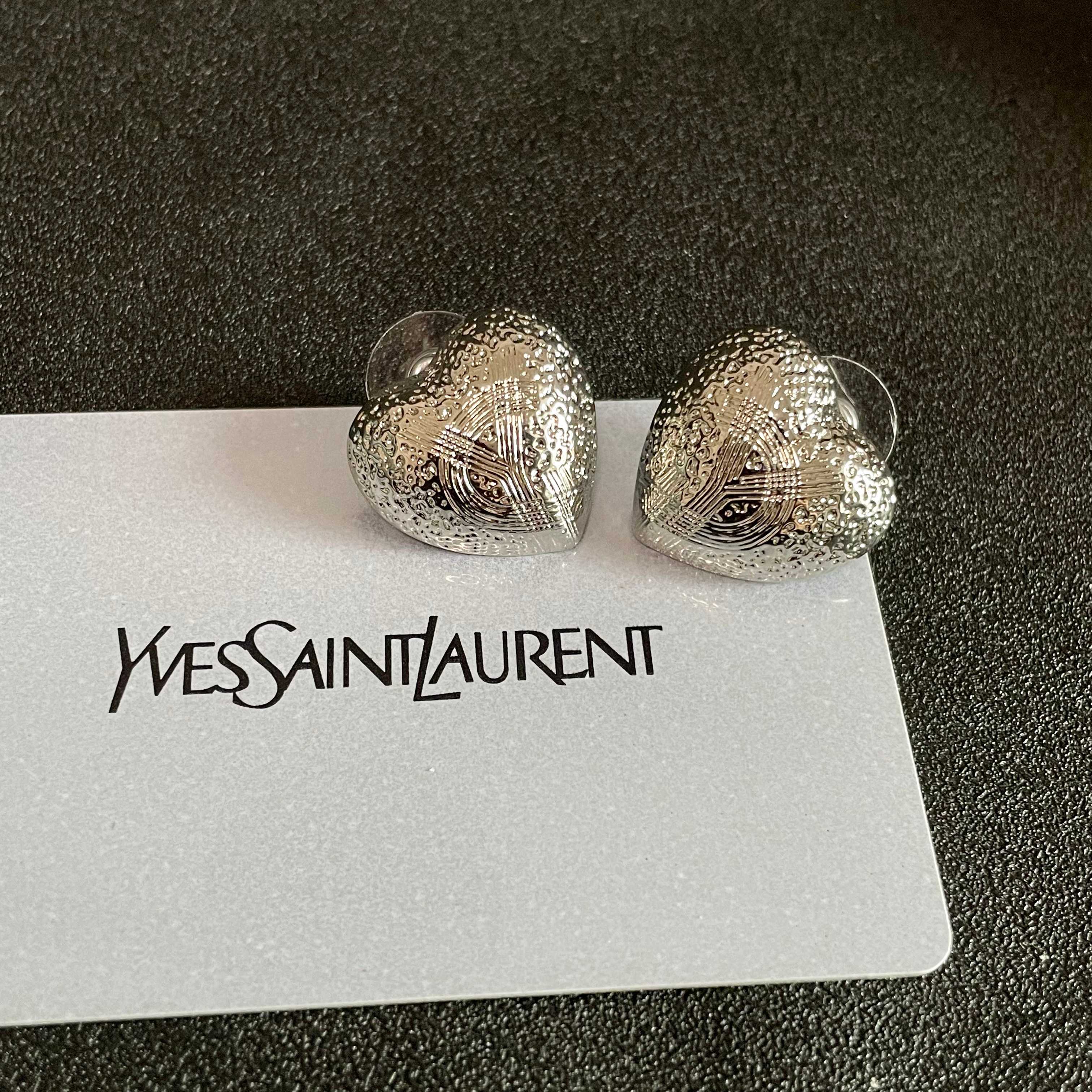 YSL 26S TEXTURED HEART STUD EARRINGS IN SILVER TONE METAL 622901