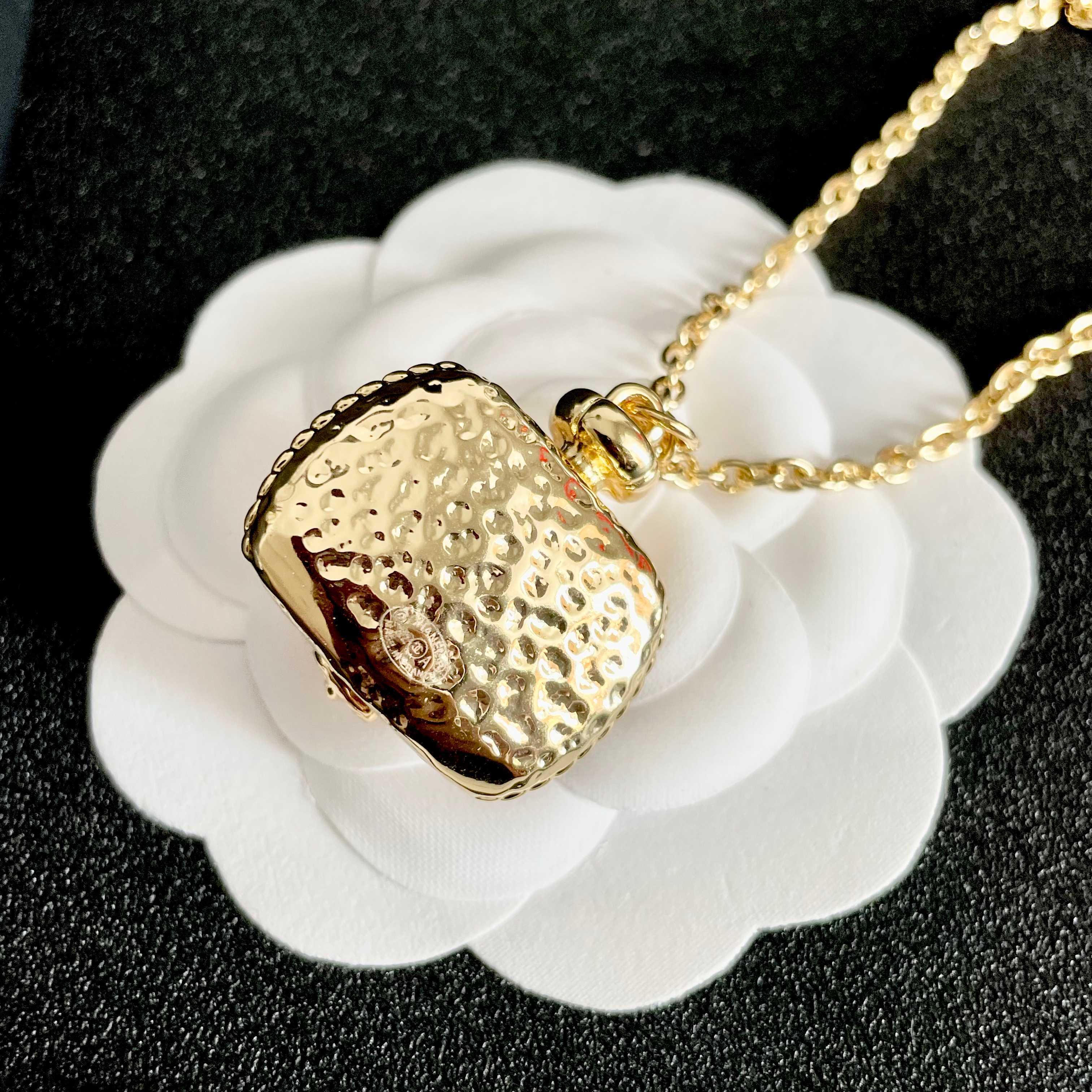CHANEL 26S DOUBLE C LOGO ORANGE RESIN STATEMENT PENDANT NECKLACE IN GOLD METAL 629172