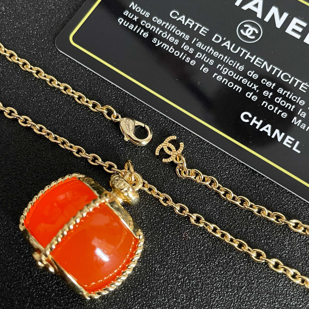 CHANEL 26S DOUBLE C LOGO ORANGE RESIN STATEMENT PENDANT NECKLACE IN GOLD METAL 629172