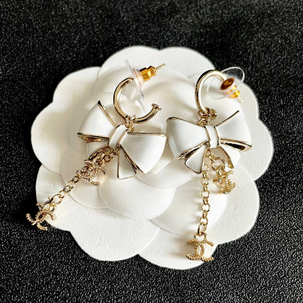 CHANEL 26S DOUBLE C LOGO WHITE ENAMEL BOW & CHAIN DROP HOOP EARRINGS IN GOLD METAL 629182