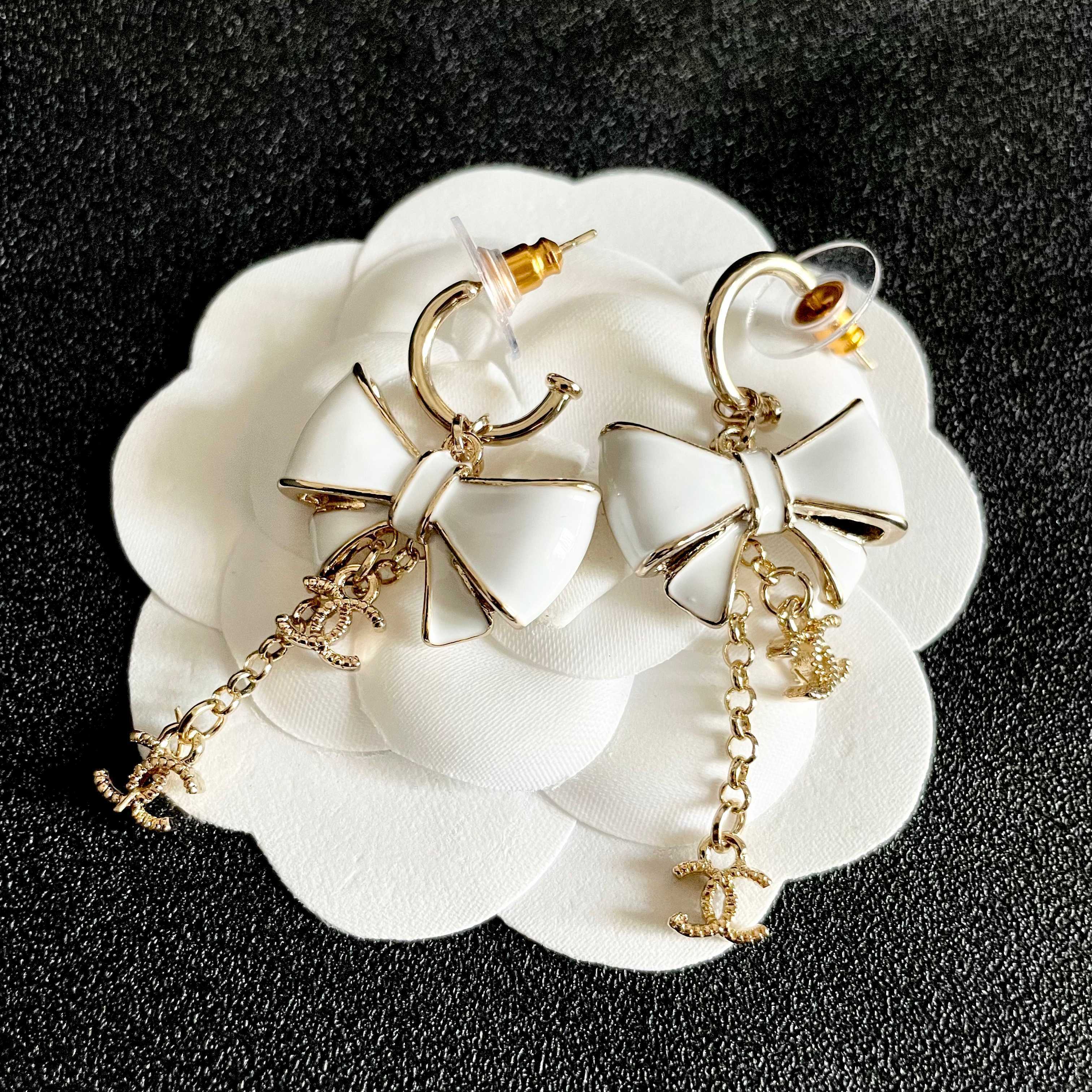 CHANEL 26S DOUBLE C LOGO WHITE ENAMEL BOW & CHAIN DROP HOOP EARRINGS IN GOLD METAL 629182