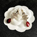 CHANEL 26S DOUBLE C LOGO CRYSTAL & RED TEARDROP DANGLE EARRINGS IN GOLD METAL 629181