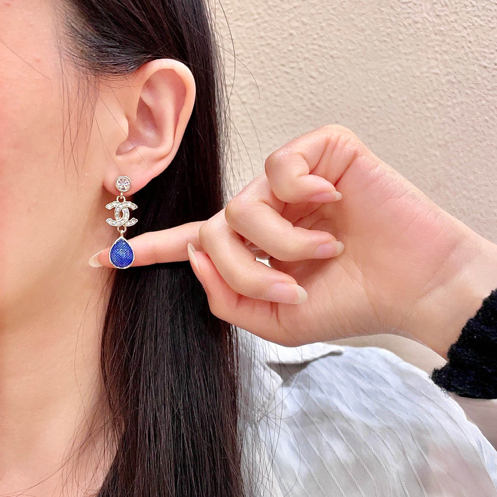 CHANEL 26S DOUBLE C CRYSTAL LOGO BLUE TEXTURED TEARDROP DANGLE EARRINGS IN GOLD METAL 629183