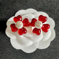 CHANEL 26S DOUBLE C CRYSTAL LOGO RED ENAMEL FLOWER STUD EARRINGS IN GOLD METAL 629185