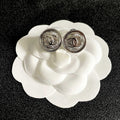 CHANEL 26S DOUBLE C LOGO ENGRAVED ROUND STUD EARRINGS IN SILVER METAL 629190