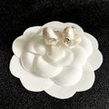 CHANEL 26S TEXTURED HEART CC LOGO STUD EARRINGS IN SILVER METAL 629192