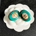 CHANEL 26S DOUBLE C LOGO GREEN ENAMEL PEARL OVAL STUD EARRINGS IN GOLD METAL 629151