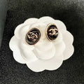 CHANEL 26S DOUBLE C LOGO BLACK ENAMEL OVAL STUD EARRINGS IN GOLD METAL 629155