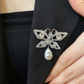 CHANEL 26S DOUBLE C LOGO CRYSTAL BOW PEARL DROP BROOCH 629165