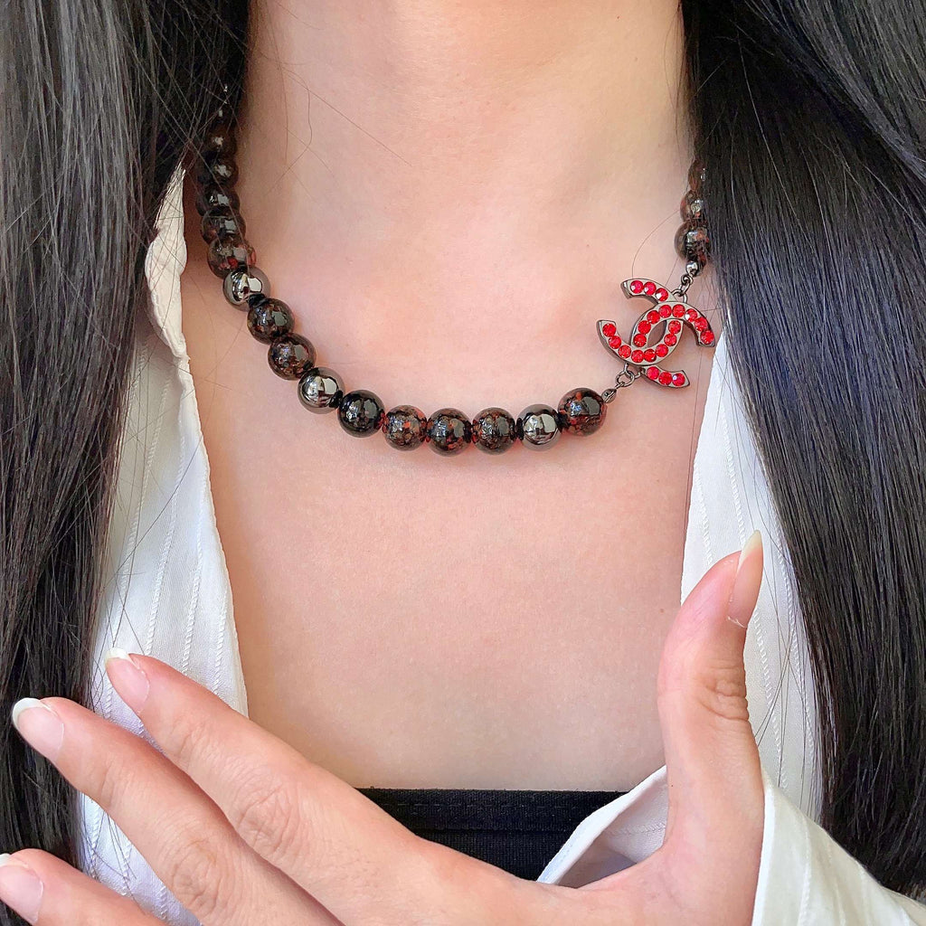 CHANEL 26S DOUBLE C LOGO RED CRYSTAL BEADED NECKLACE IN BLACK METAL 629968