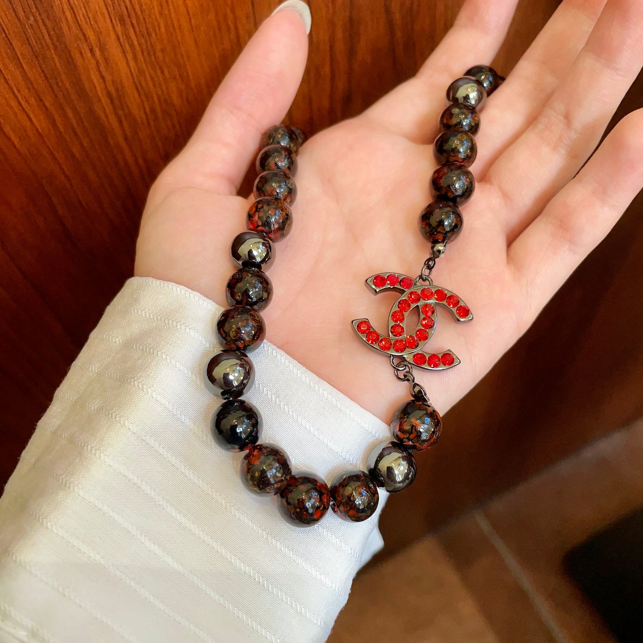 CHANEL 26S DOUBLE C LOGO RED CRYSTAL BEADED NECKLACE IN BLACK METAL 629968