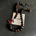 CHANEL 26S DOUBLE C LOGO RED CRYSTAL BEADED NECKLACE IN BLACK METAL 629968