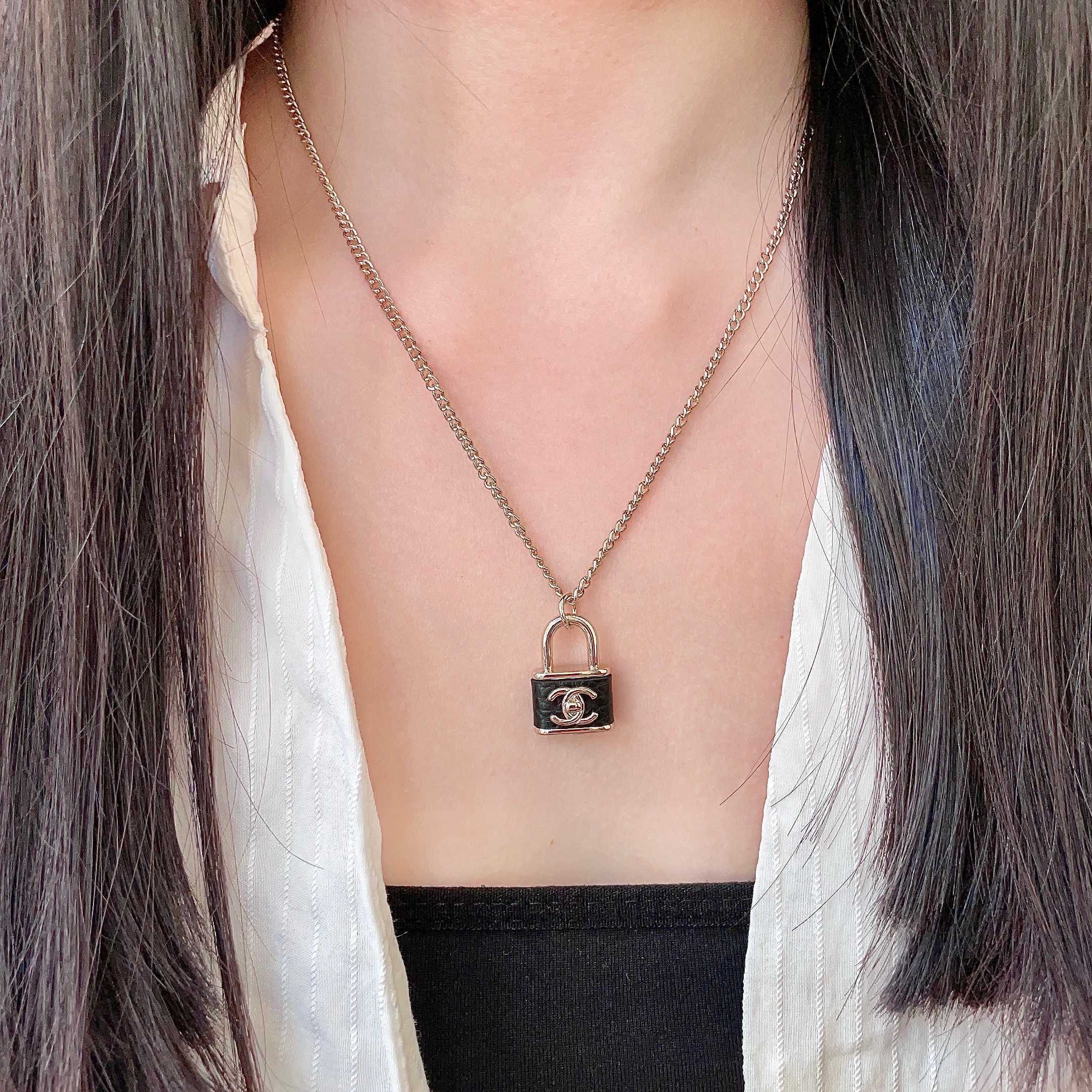 CHANEL 26S DOUBLE C LOGO PADLOCK CHAIN NECKLACE IN GOLD & BLACK METAL 629974
