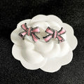 CHANEL 26S PINK ENAMEL BOW CRYSTAL STUD EARRINGS IN BLACK METAL 629977
