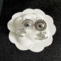 CHANEL 26S DOUBLE C LOGO CRYSTAL HALO DROP EARRINGS IN SILVER METAL 629987
