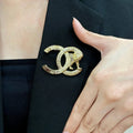 CHANEL 26S DOUBLE C LOGO LION EMBLEM BROOCH IN GOLD METAL 629997